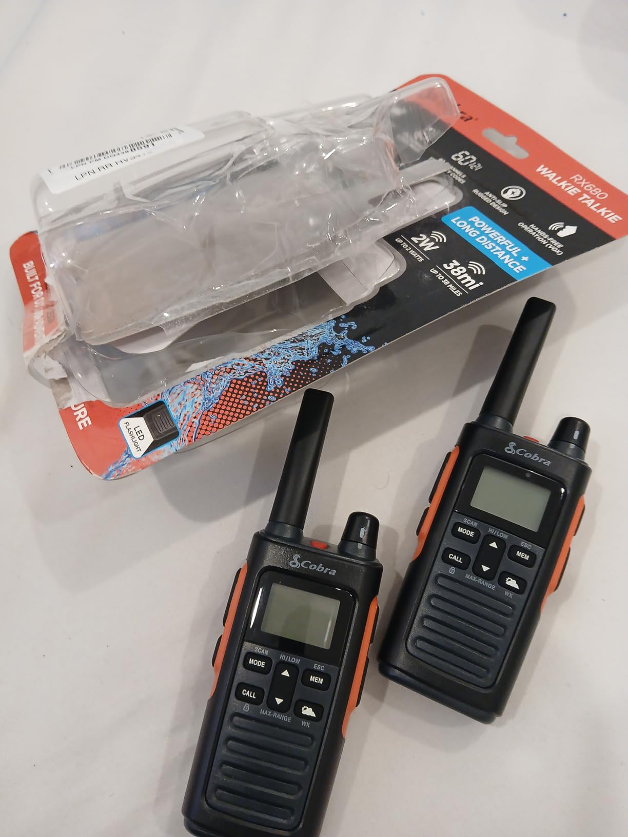 Cobra RX680 Walkie Talkies (2-Pack) - Rugged & Splashproof Two Way Radios Long Range, IP54 Water Resistant Design, 60 Pre-Programmed Channels, Weather Alerts, Included Charging Dock (Black/Orange) - Customer Photo 2