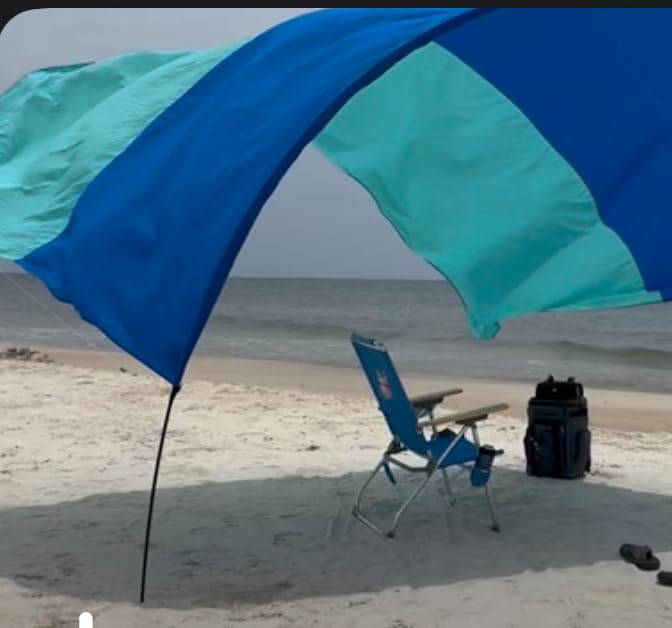 New Shibumi Shade® Classic with Quiet Canopy, The Original Wind-Powered® Beach Shade, Shade for 8 People, Weighs Only 4 lbs, Sets up in 3 Minutes. Wind Assist Included Customer Review New Shibumi Shade® Classic with Quiet Canopy, The Original Wind-Powered® Beach Shade, Shade for 8 People, Weighs Only 4 lbs, Sets up in 3 Minutes. Wind Assist Included - Customer Photo 4