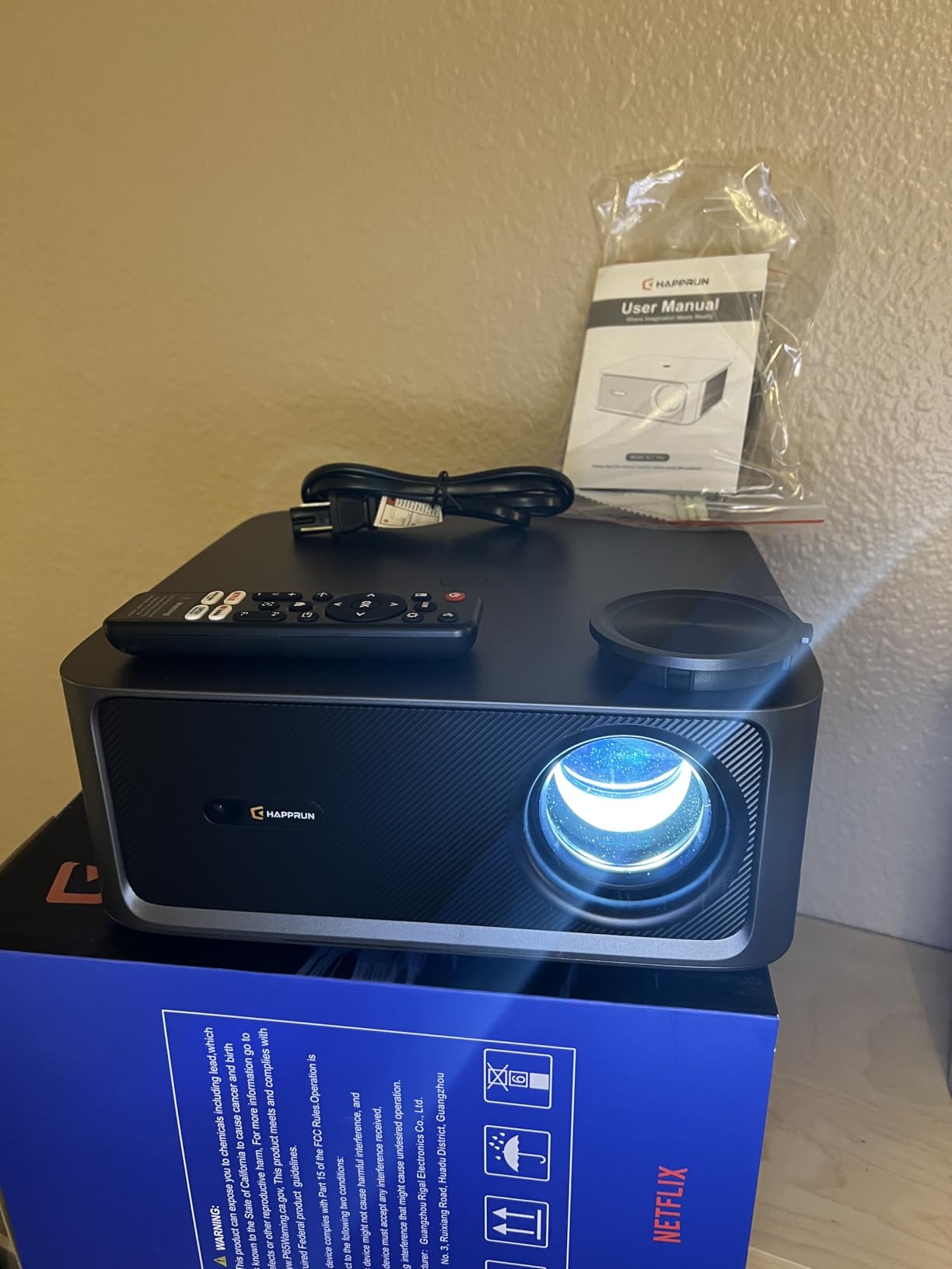 2500 ANSI Lumen Official Netflix Licensed 4K UHD Smart Projector, HAPPRUN Home Theater with Dolby Audio, Wi-Fi 6 & Bluetooth 5.2, Built-in Streaming Apps, Works with Smartphones, Indoor & Outdoor Use - Customer Photo 2