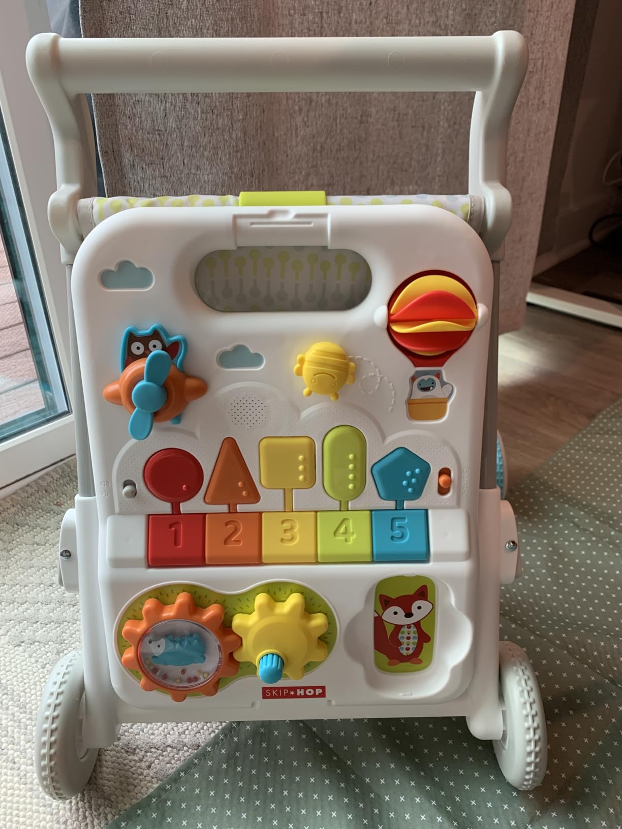 Skip Hop Baby Walker 4-in-1 Sit to Stand Convertible Light Up Music Toy with 40+ Activities Explore & More Age 6m+ - Customer Photo 3
