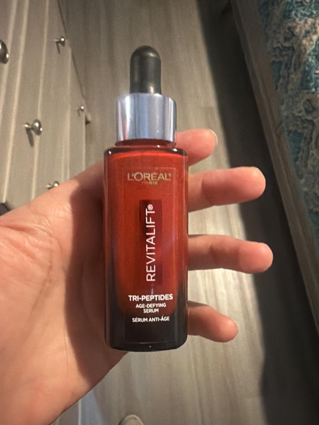 L'Oreal Paris Revitalift Triple Power Face Serum with Tri-Peptides, Hyaluronic Acid and Vitamin C, Anti Aging, Anti Wrinkle Serum to Firm and Brighten, 1 FL oz, + Sample customer photo 1