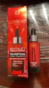 L'Oreal Paris Revitalift Triple Power Face Serum with Tri-Peptides, Hyaluronic Acid and Vitamin C, Anti Aging, Anti Wrinkle Serum to Firm and Brighten, 1 FL oz, + Sample customer photo 2