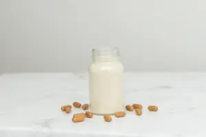 A premium bottle of Betaine HCl supplements on a marble surface, featured in the 7 Best Betaine HCl Supplements for Low Stomach Acid guide.